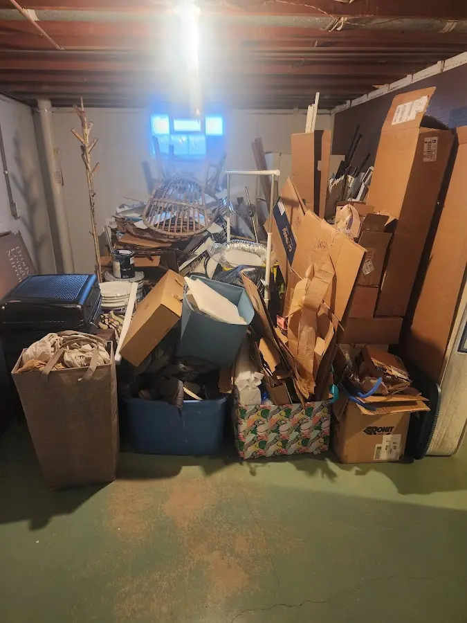 Roll-off dumpster container at job site for Concrete Dumpster Rental in New Lexington